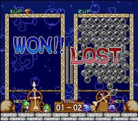 une photo d'Ã©cran de Puzzle Bobble - Bust a Move sur Nintendo Super Nes